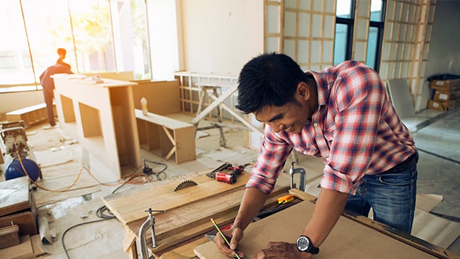 Man doing woodworking Man doing woodworking