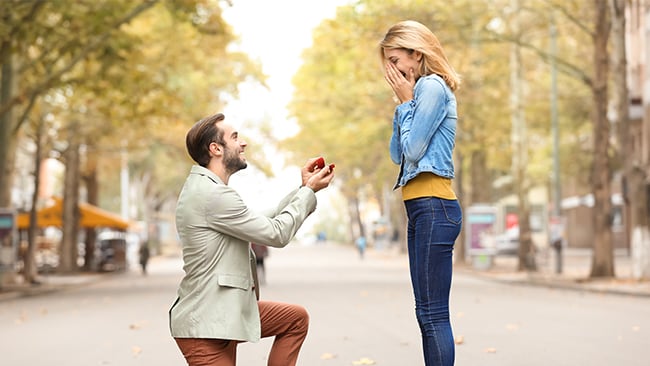 Man proposing in the street Man proposing in the street